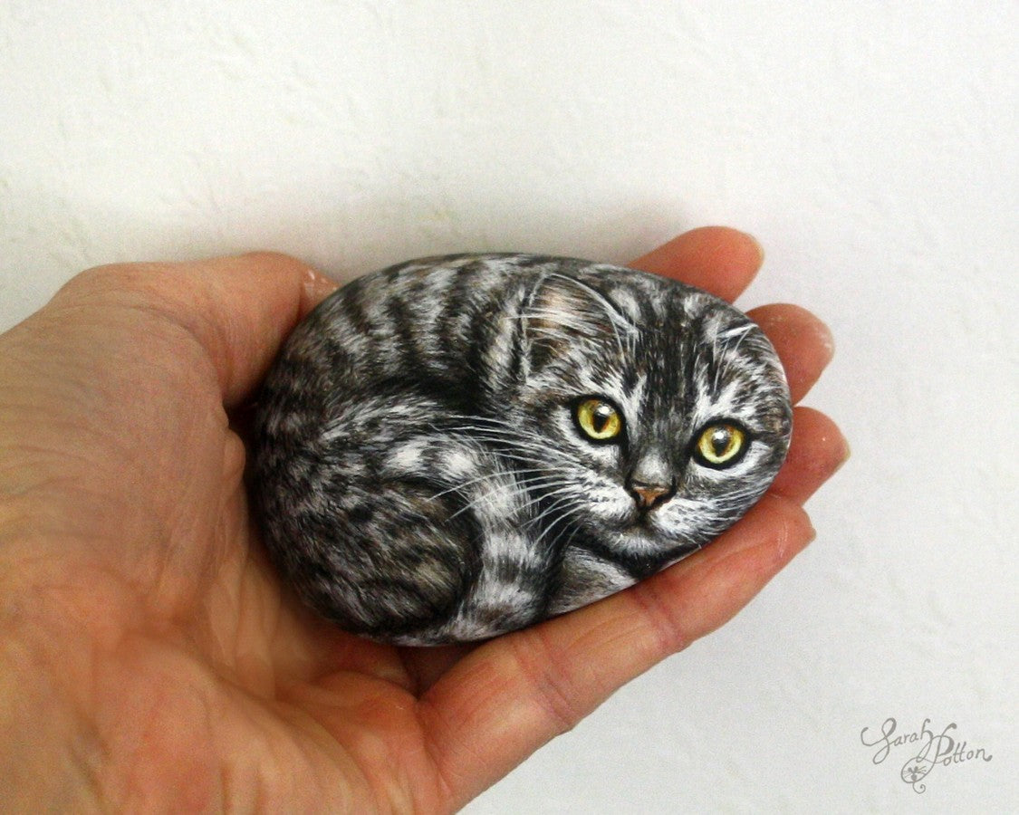 grey tabby cat painted stone