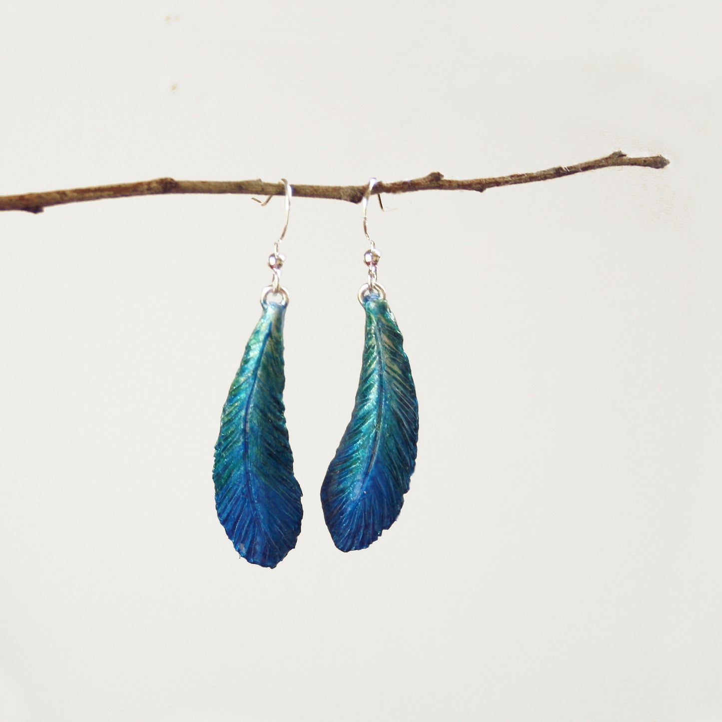 Tui Feather Earrings