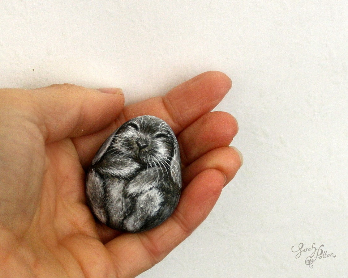 painted rock of a grey rabbit - animal pet art