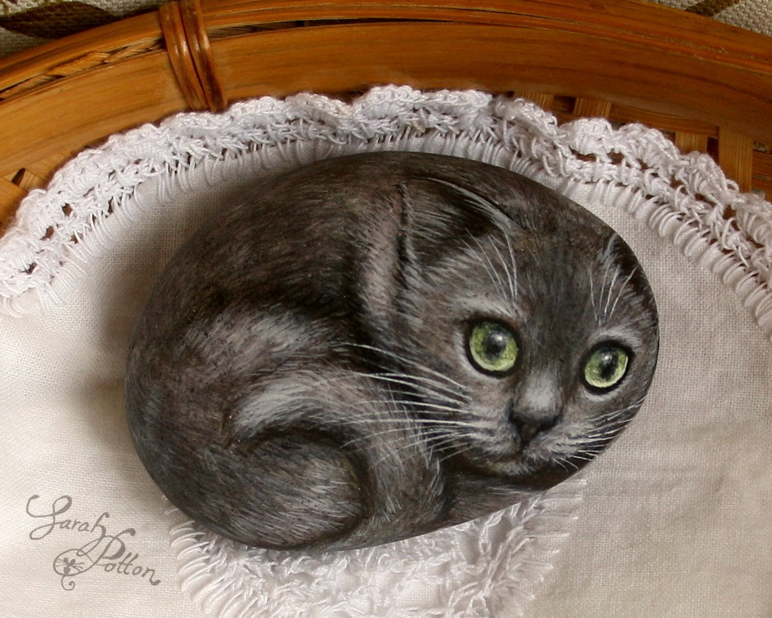 russian blue cat painted on a stone