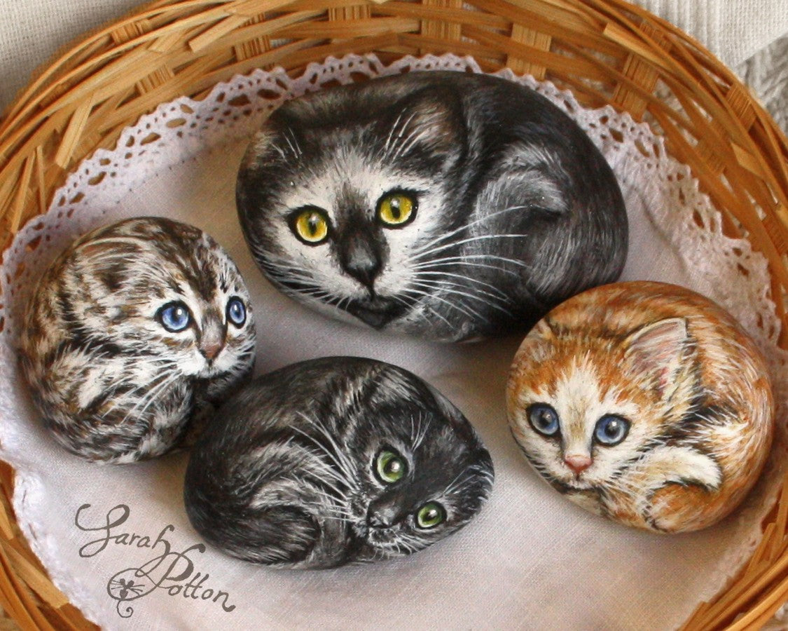 painted rocks - cat ornaments