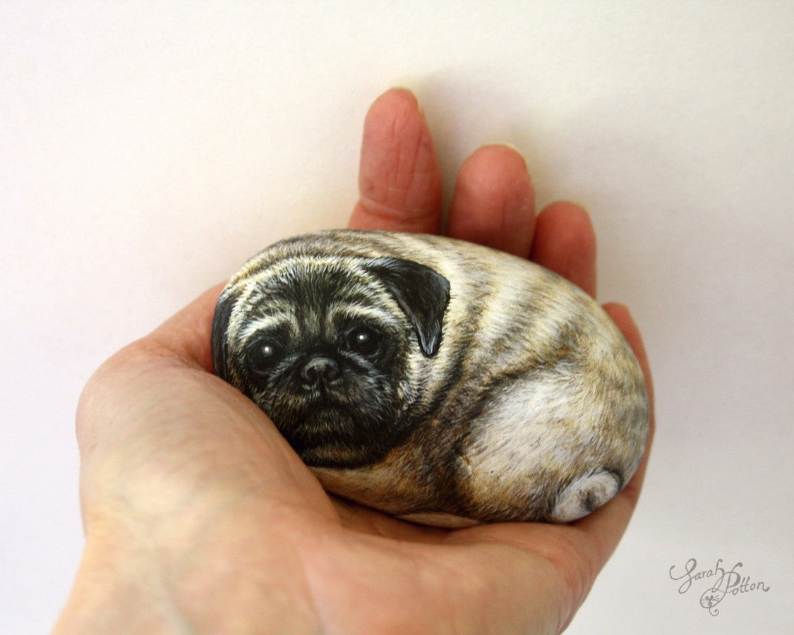 pug dog hand painted stone by sarah potton